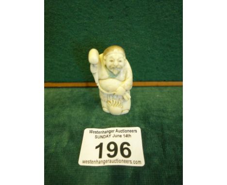Small carved Netsuke signed to base 2" tall of a Happy Buddha