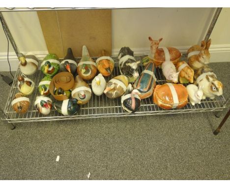Shelf containing a large amount of Pate dishes and lids, modelled as animals including Ducks, Cow, Sheep and Rabbits