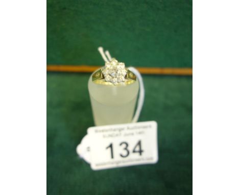 Superb Ladies 9ct gold Diamond cluster ring, a centre diamond surrounded by a cluster of Diamonds approx .75ct diamond in tot
