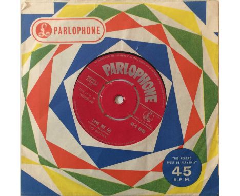 Fantastic condition original UK copy of the debut 45 from The Beatles. The record (red Parlophone labels, 45-R 4949 with 'MAD