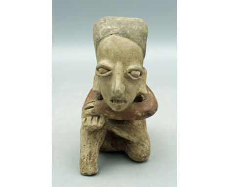 A choice Pre-Columbian Pensador (Thinker) figurine from Jalisco, West Mexico. Ca. 200 BC - 350 AD. This excellent example is 