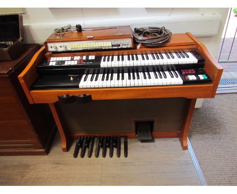 A 1960's Lowrey Organ distributed by Selmer together with a Leslie Organ speaker cabinet with Jensen Special Design Speaker t