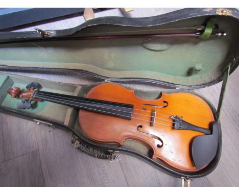 A Chinese student's violin, cased with bow 