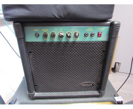 A Rocketmusic practice amplifier together with W Audio DA500 Pro Power Amplifier (2)