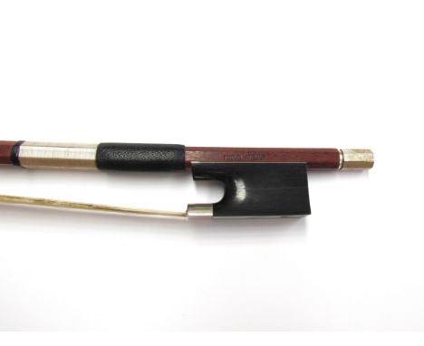 A Swiss Finkel Atelier violin bow with round stick, ebony frog set with mother of pearl inlay and silver plated adjuster, sta