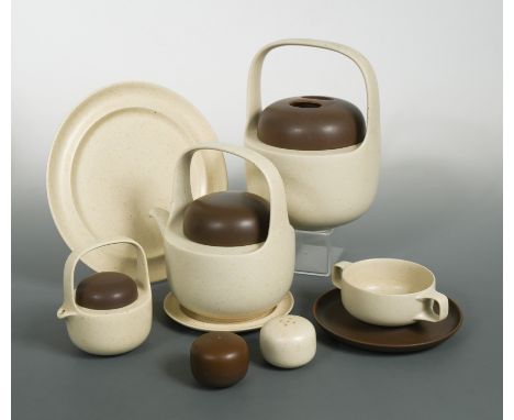 in two-tone Brasil colourway of brown and oatmeal glaze, comprising teapot and cover, milk jug and cover, two sugar bowls and