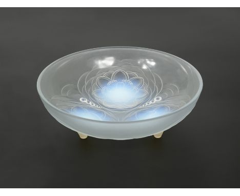 moulded with three flower heads developing into feet, moulded mark 26cm diameterCondition report: In good condition, light su