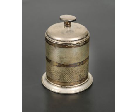 Birmingham 1936, of engine turned cylindrical form with pull-up cover 12.5cm high