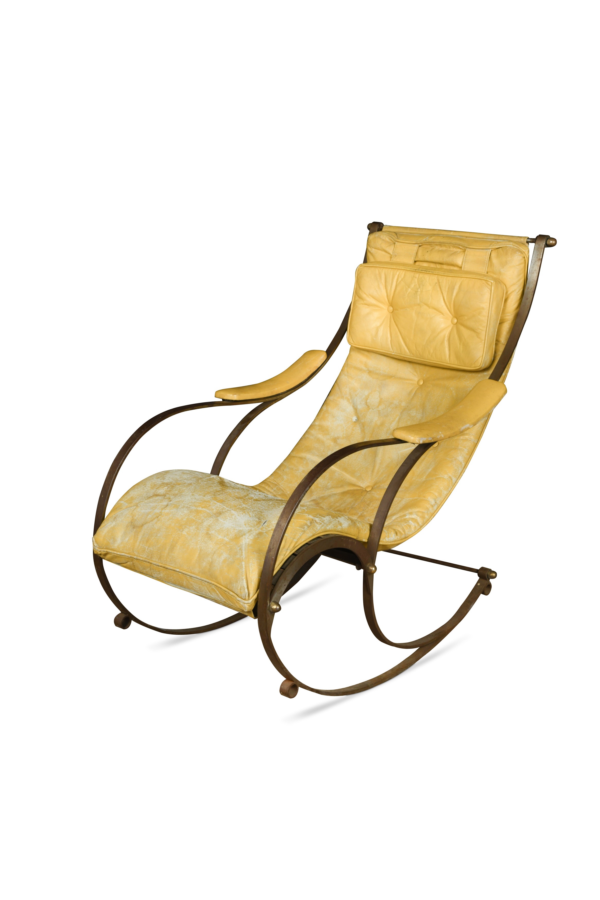 An early 20th century bent steel rocking chair in the ...