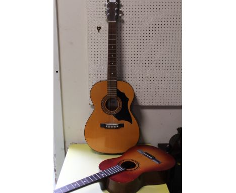 A VINTAGE ACOUSTIC GUITAR TOGETHER WITH A SMALL UNSTRING EXAMPLE (2)