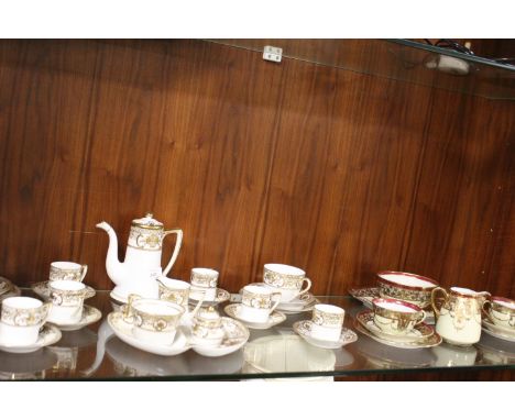 A NORITAKE PART TEA &amp; COFFEE SERVICE, comprising coffee pot, cream, sugar, six coffee cans and saucers, two tea cups &amp