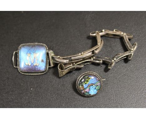 A VINTAGE SILVER AND BUTTERFLY WING BRACELET TOGETHER WITH A BROOCH