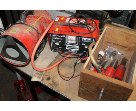 A PROPANE SPACE HEATER, A 15 AMP 12 / 24V VEHICLE BATTERY SUPERCHARGER AND THREE CLARKE AIR TOOLS