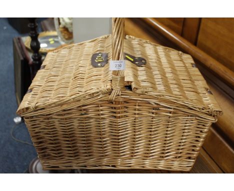 A WICKER DOUBLE SIDED PICNIC HAMPER AND CONTENTS 