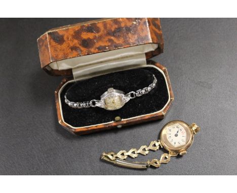 A VINTAGE BULOVA 10ct WHITE ROLLED GOLD WATCH PLUS ONE OTHER