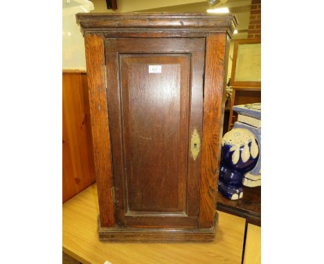 A SMALL VINTAGE OAK CORNER CUPBOARD