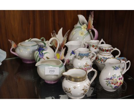 A COLLECTION OF FRANZ PORCELAIN TOGETHER WITH A SELECTION OF ROYAL WORCESTER JUGS MANY WITH BOXES 