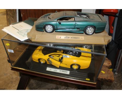 TWO JAGUAR MODEL CONCEPT CARS WITH ONE DISPLAY BOX