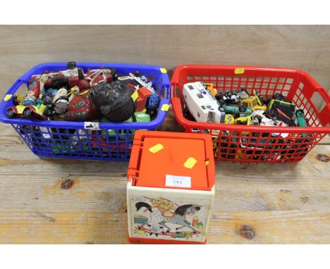 TWO BASKETS OF VINTAGE TOY CARS ETC TOGETHER WITH A FISHER PRICE JACK IN THE BOX