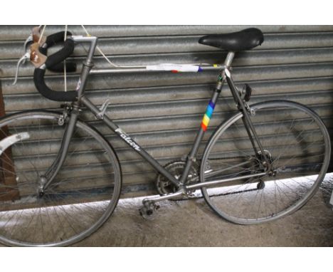 A VINTAGE FALCON GENTS RACING BIKE WITH 12 GEARS