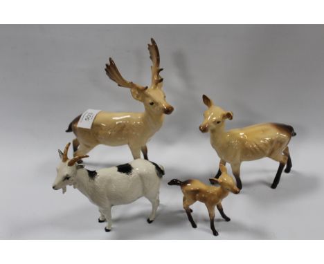 A BESWICK DEER TRIO TOGETHER WITH A MODEL OF A GOAT (4)