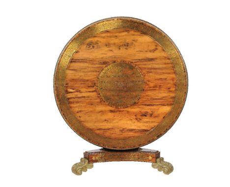 A goncalo alves, brass marquetry and gilt metal mounted centre table, second quarter 19th century, the circular top with enga