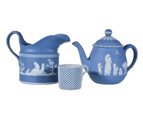 A Wedgwood solid-blue Jasper small teapot and cover, circa 1790, sprigged in white with 'Domestic Employment' scenes, impress