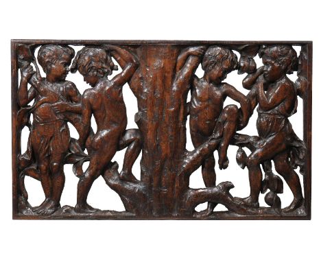 A pair of Arts & Crafts carved oak panels, circa 1900, possibly stair panels, each rectangular panel carved on both sides and