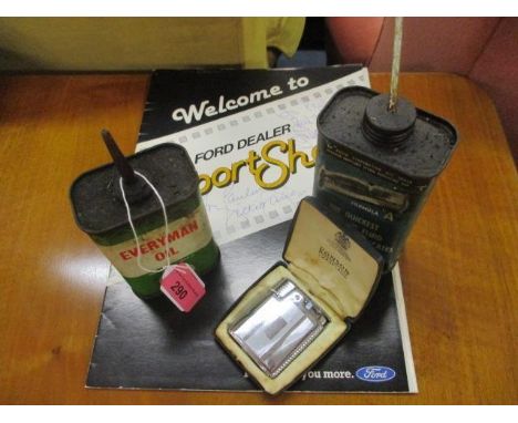 Two vintage oil tins, a signed Ford Sport Show programme and a Ronson lighter 