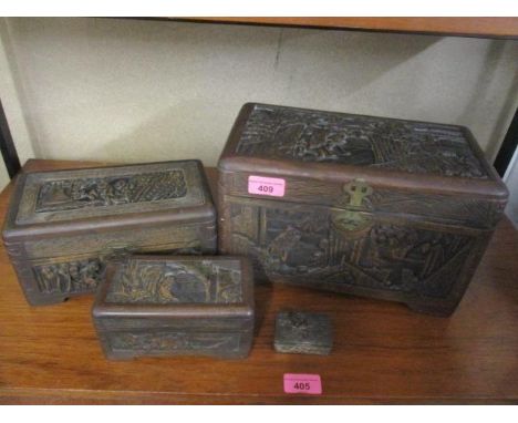Three early 20th century Asian carved graduated boxes, together with a silver plated trinket box 