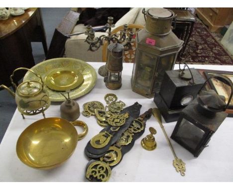 Metalware to include horse brasses, trays, a candelabra, a miners lamp and other items 