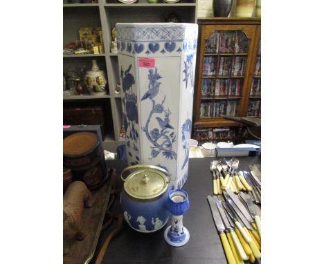 A modern blue and white oriental inspired umbrella stand, a Wedgwood ginger jar with silver plated lid and a small blue and w