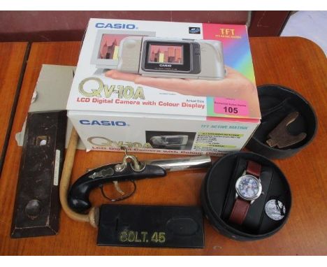 A mixed lot to include a Zippo watch, a lighter in the form of a gun and a casino camera 