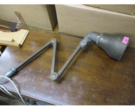 An early 20th century industrial anglepoise lamp 