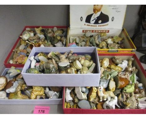 A large quantity of Wade and other ceramic model animals 