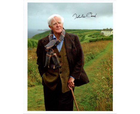 LE CARRE JOHN: (1931-2020) British author of espionage novels. Signed colour 8 x 10 photograph of the novelist standing outdo