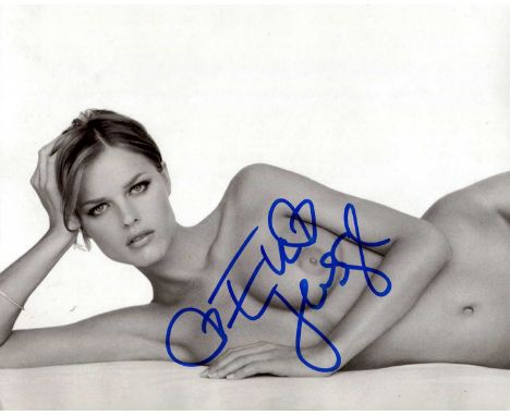 HERZIGOVA EVA: (1973- ) Czech Model and Actress. A good signed 10 x 8 photograph of Herzigova, the attractive image depicting