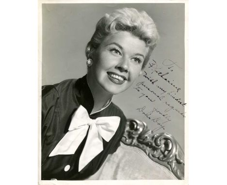 DAY DORIS: (1922-2019) American actress and singer. Vintage signed and inscribed 8 x 10 photograph, an engaging image of the 