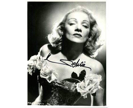 DIETRICH MARLENE: (1901-1992) German-born American actress and singer. Signed 7 x 9.5 photograph of the actress in a head and