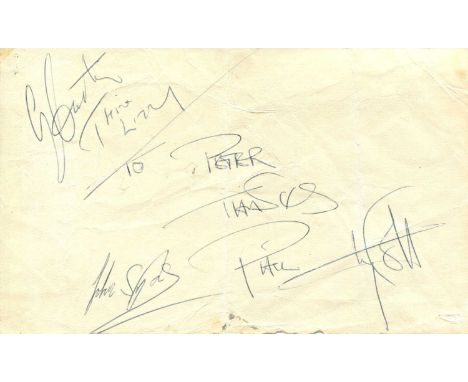 THIN LIZZY: A small oblong 8vo page individually signed by three members of the Irish hard rock band Thin Lizzy, comprising P