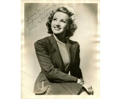 GRABLE BETTY: (1916-1973) American dancer, singer and actress, the number one pin-up girl of World War II. Vintage signed and