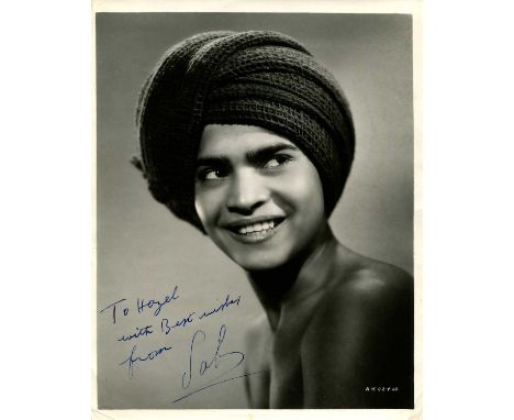 SABU: (1924-1963) Indian actor. A good vintage signed and inscribed 8 x 10 photograph of Sabu in a head and shoulders pose in