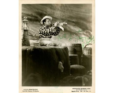 ARMSTRONG LOUIS: (1901-1971) American jazz trumpeter and vocalist. A good vintage signed and inscribed 8 x 10 photograph, the