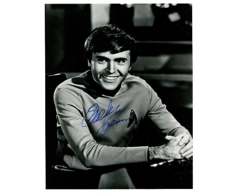 KOENIG WALTER: (1936- ) American actor. Signed 8 x 10 photograph of Koenig seated in a half-length pose, in costume from his 