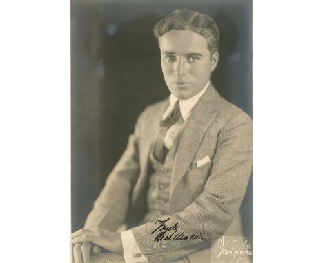 CHAPLIN CHARLES: (1889-1977) English film comedian, Academy Award winner. A wonderful, large vintage signed 9 x 13 photograph