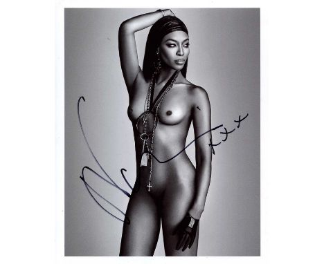 CAMPBELL NAOMI: (1970- ) British model. A very fine signed 8 x 10 photograph of Campbell, the attractive image depicting the 
