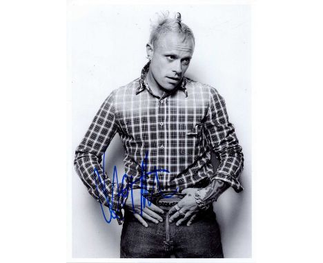 FLINT KEITH: (1969-2019) English singer, vocalist with the electronic dance band the Prodigy. Signed 5 x 7 photograph of Flin