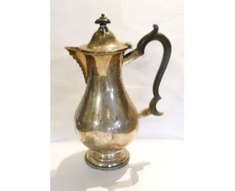 A London Silver Coffee Pot with scroll ebony handle and ebony finial, 21 ozs.