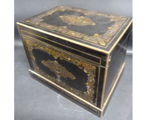An Early 19th Century French Boulle Decanter Box, the hinged top and sides enclosing a fitted interior with three gilded glas