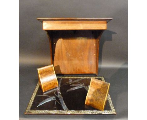 A Mahogany Clock Bracket, together with a pair of burr walnut bookends and a mother of pearl inlaid rectangular plaque